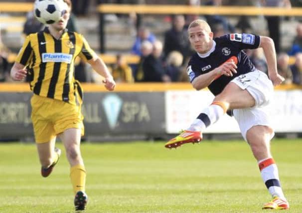 Scott Griffiths has penned a new deal at Kenilworth Road