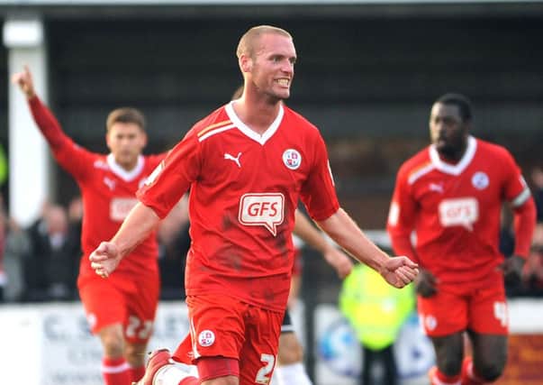 Andy Drury celebrates a goal for Crawley - pic: Jon Rigby