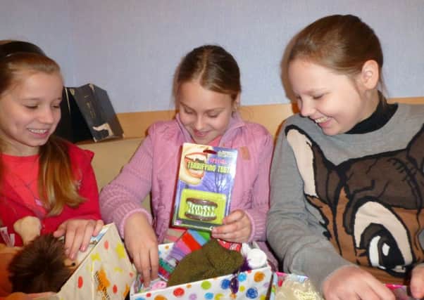 Belarus children with shoeboxes from  Operation Christmas Child
