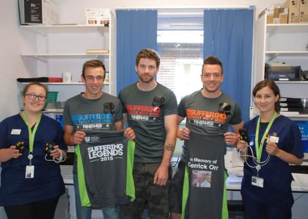 Kris, Scott and Leon met the nurses to present the cheque to the department