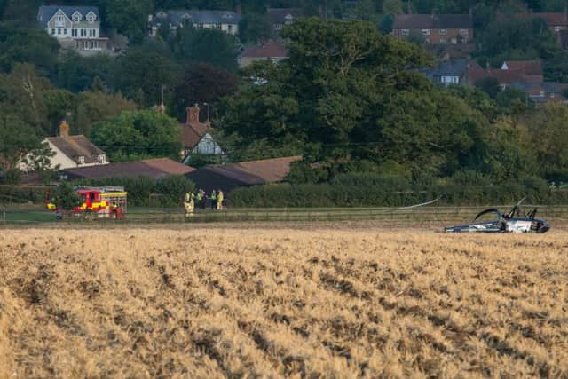 The wreckage of the helicopter that crash landed in a field near Aldbury on September 9, 2015. Photo: Adam Hollier