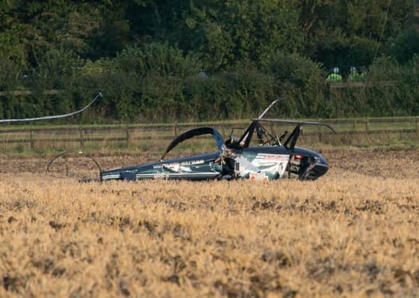 The wreckage of the helicopter that crash landed in a field near Aldbury on September 9, 2015. Photo: Adam Hollier