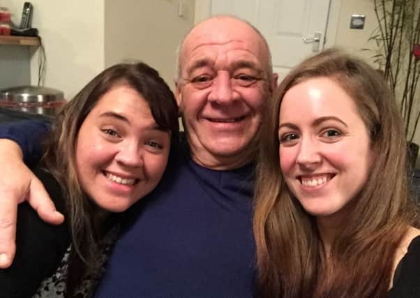 Ronnie Slade with daughters Laura, left, and Carly