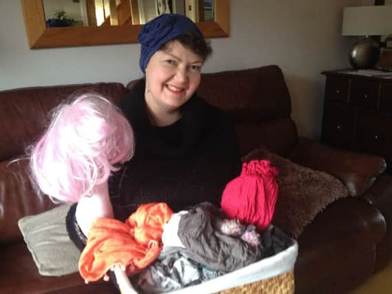 BBC 3CR presenter Helen Legh with some of the hats and wigs she bought after losing her hair following chemotherapy