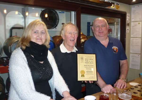 Bald Buzzard proprietors Alison Bennett & Phil Taylor with South Beds CAMRA chairman Roy Chatto