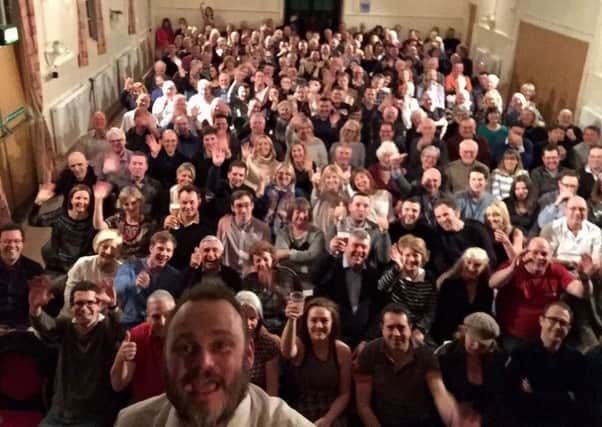 Al Murray takes a Twitter selfie during his show at Stewkley Village Hall on Friday night