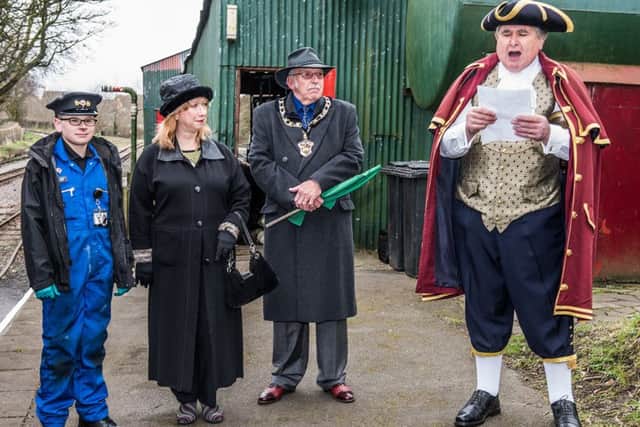 Leighton Buzzard Narrow Gauge Railway launch new season - Town Crier Peter Hailes entertains with a specially written 'cry' while the Mayor Ray Berry, Mrs Berry and volunteer Liam Smith look on.