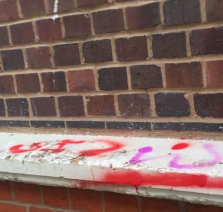 Vandalism at Market Cross and Lloyds Bank