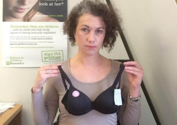 Sarah Champion MP with the children's bra which she says is "too sexualised" NNL-160513-101002001