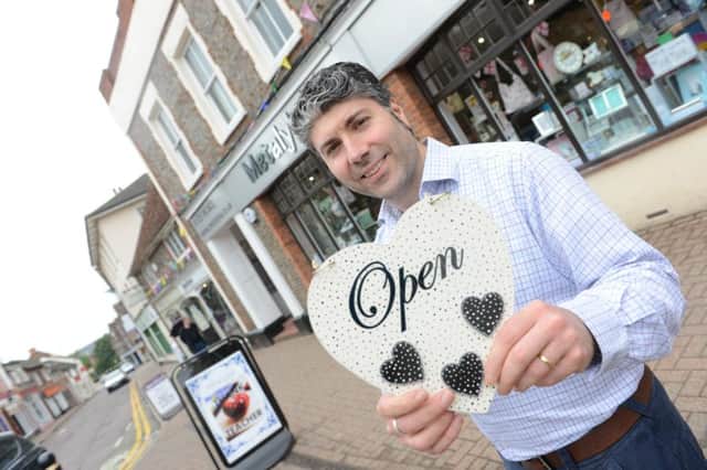 Gennaro Borrelli outside the open independent shops