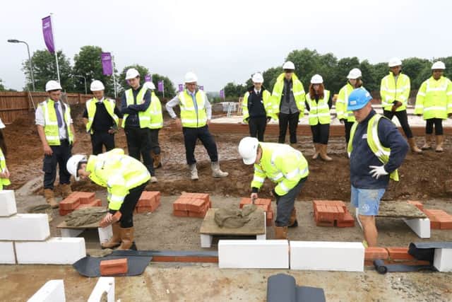 Bucks UTC students learn the delicate art of bricklaying from Taylor Wimpey staff