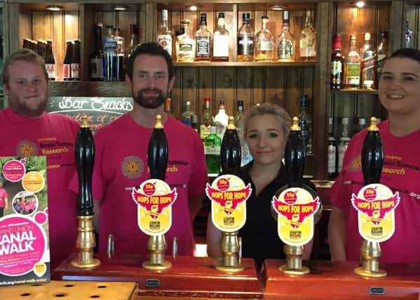 Thee Locks staff promote Hops for Hope - 25p from each pint will go to Brain Tumour Research during September