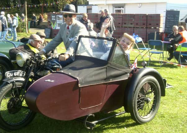 Singer Fiona Harrison and companion in a 1924 Scott motorcyle combination