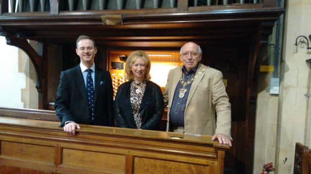 Cllr Ray Berry (Mayor 2015) and Mrs Berry with Richard Hills at the console of the St. Barnabas organ