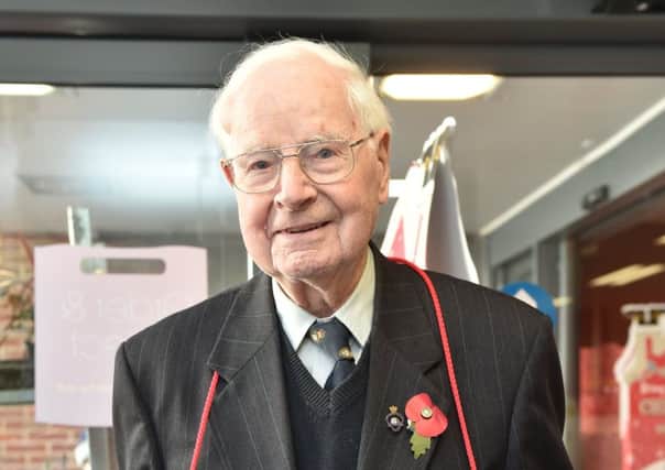 Wally Randall is still selling poppies at the age of 101