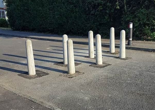 The new concrete bollards between Garland Way and Kingfisher