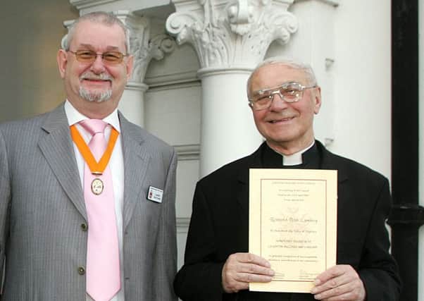 Rev Peter Lymbery receives his Honorary Burgess accolade from Cllr Mark Freeman in 2007