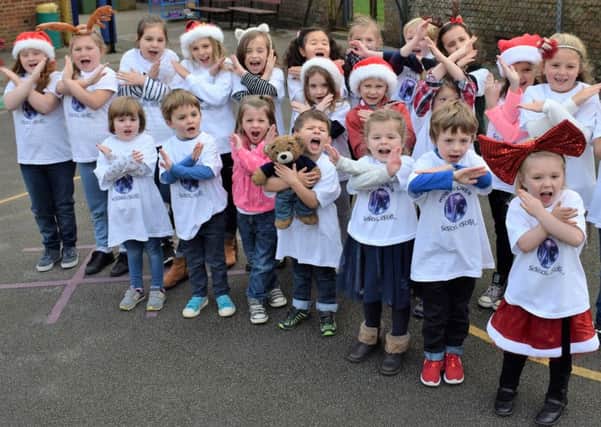 Woburn Lower School choir hope to top the Christmas charts with I Want a Hippopotamus for Christmas