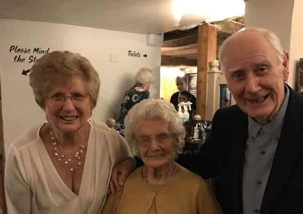 Centenarian Grace Scott with daugher Patricia and son Paul