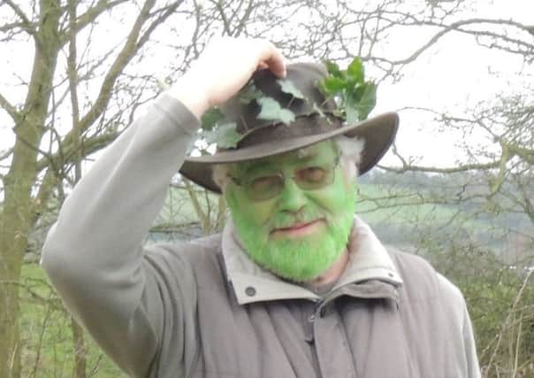 The Wassail king leads the traditional mid-winter ceremony to ensure a good apple harvest