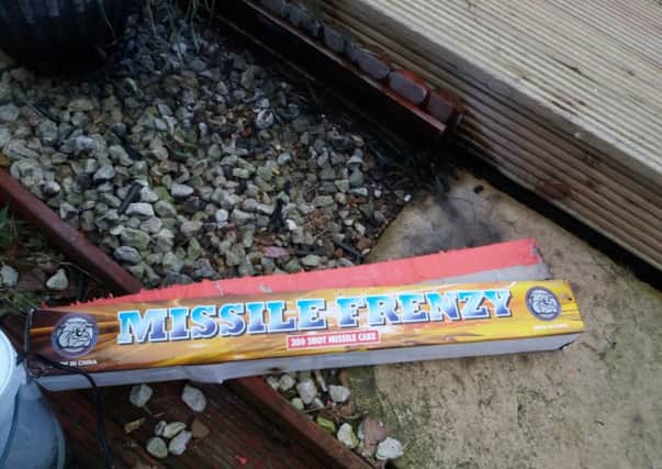 The firework box that was lit and thrown into the garden