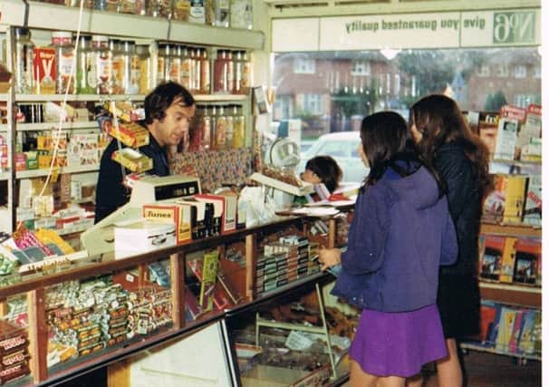 Tom in the shop when it first opened
