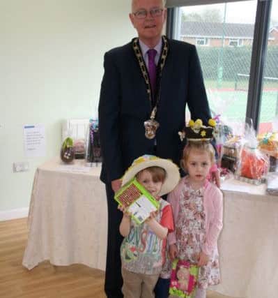 Mayor of Leighton Buzzard Stephen Cotter with the winners of the Easter bonnet parade