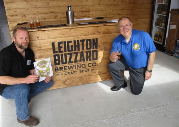 Jon d'Este-Hoare of the Leighton Buzzard Brewing Co and David Rosie of the Friends of Leighton-Linslade In Bloom.