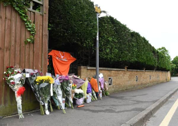 Tributes have been left at the scene of the fatal collision on Southcourt Avenue. Photo by Jane Russell
