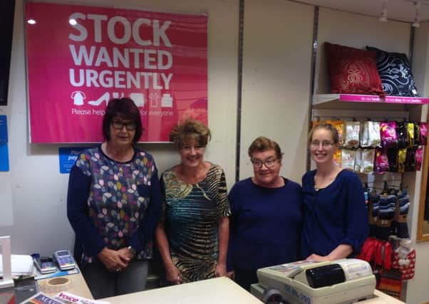 L-R: volunteers Jane Gray, Sally Kempster and Christine Henry with assistant manager Catt Downs.