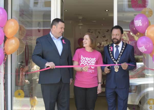 Breast Cancer Care's Andy Harris, director of fundraising and marketing, with Heather and Town Mayor Cllr Rahman