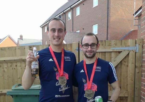 Alex (left) and Matt with their medals