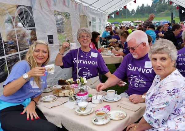 The Cancer Research UK Relay for Life event last year, illustrating the key events the charity hold. Ali hopes to support this year's event in September, too.