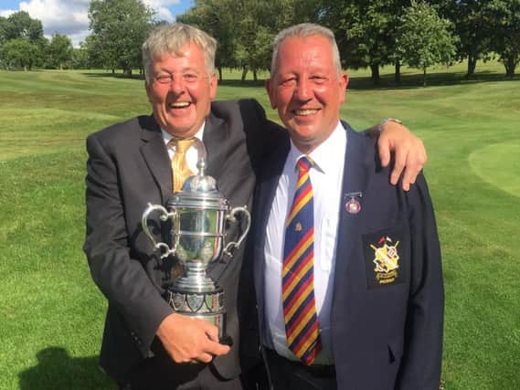 David Banwell with his trophy and County President David Hawkins.