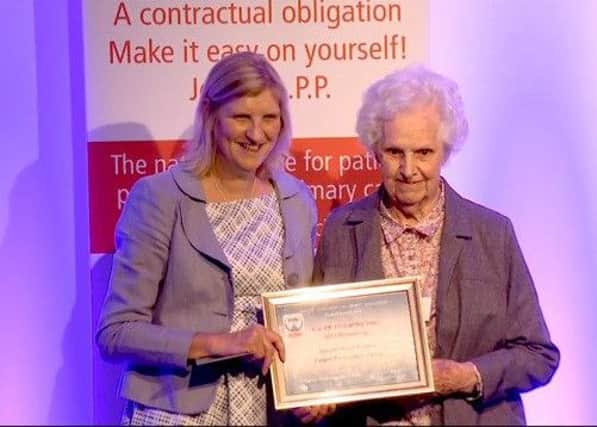 Margaret Brown accepted the award behalf of the Bassett Road Surgery PPG from Kim Tully of the General Medical Council, on Margaret's 87th birthday