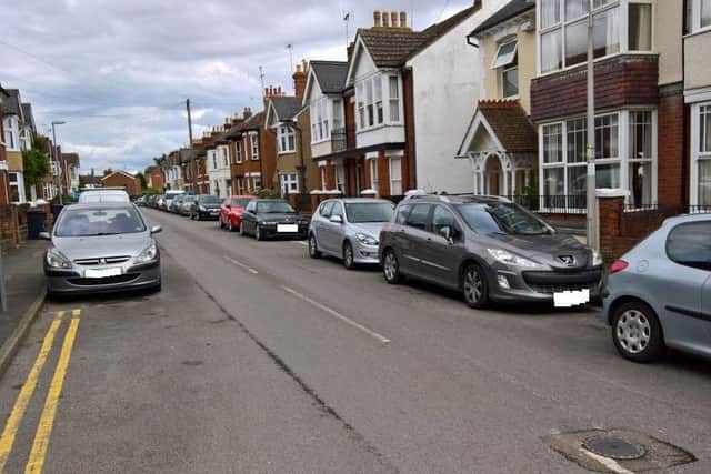 Cars parked on Hartwell Crescent. Photo taken by Mr Aitken outside his home