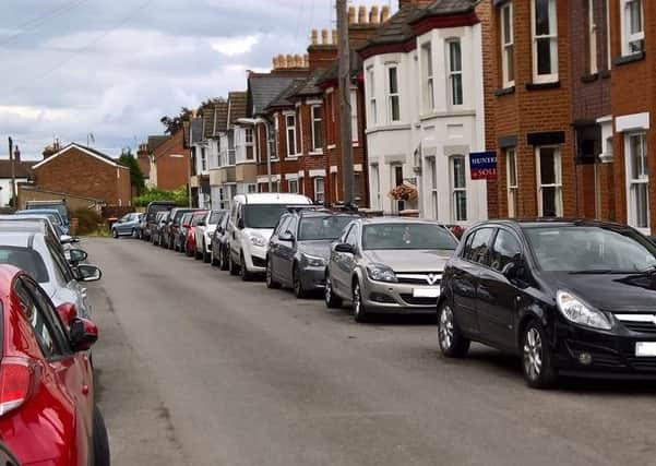 Cars parked on Hartwell Crescent. Photo taken by Mr Aitken outside his home