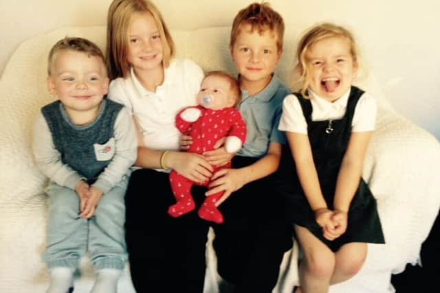 Arlo with all his siblings when he first came out of hospital. From left to right: Mason, Summer, Arlo, Ashton & Molly.